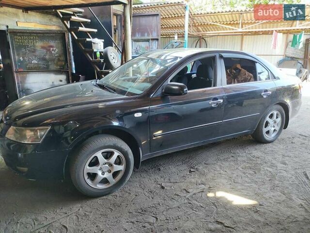 Черный Хендай Соната, объемом двигателя 2 л и пробегом 345 тыс. км за 5100 $, фото 9 на Automoto.ua
