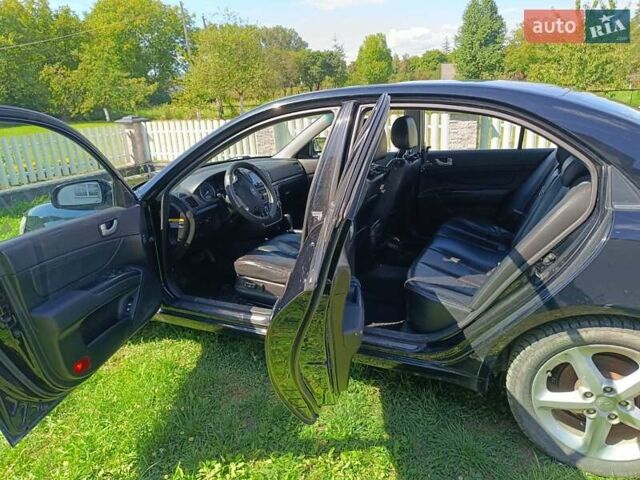 Черный Хендай Соната, объемом двигателя 2 л и пробегом 240 тыс. км за 5500 $, фото 9 на Automoto.ua