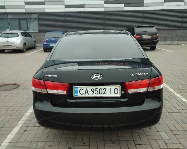 Черный Хендай Соната, объемом двигателя 2 л и пробегом 244 тыс. км за 6000 $, фото 4 на Automoto.ua