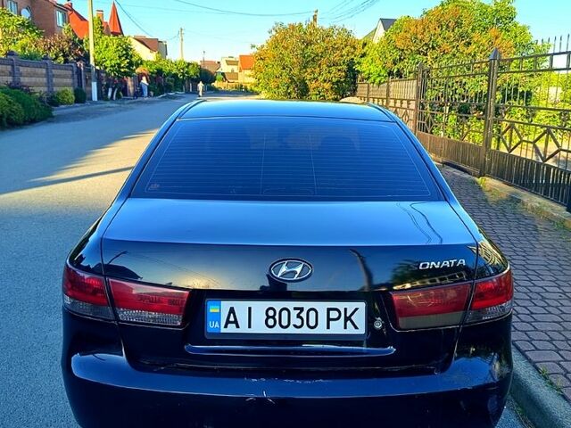 Черный Хендай Соната, объемом двигателя 2 л и пробегом 320 тыс. км за 6200 $, фото 1 на Automoto.ua