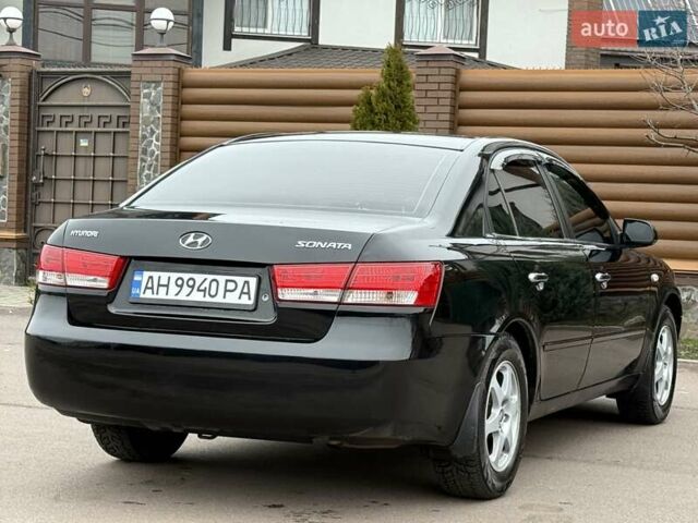 Черный Хендай Соната, объемом двигателя 2 л и пробегом 217 тыс. км за 6200 $, фото 27 на Automoto.ua