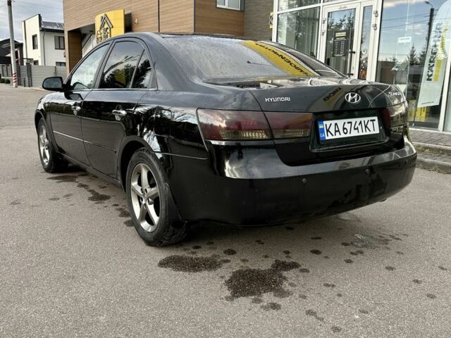 Чорний Хендай Соната, об'ємом двигуна 2.4 л та пробігом 270 тис. км за 4900 $, фото 7 на Automoto.ua