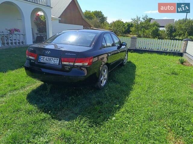 Черный Хендай Соната, объемом двигателя 2 л и пробегом 240 тыс. км за 5500 $, фото 1 на Automoto.ua