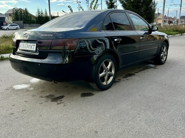 Чорний Хендай Соната, об'ємом двигуна 2.4 л та пробігом 270 тис. км за 4900 $, фото 12 на Automoto.ua