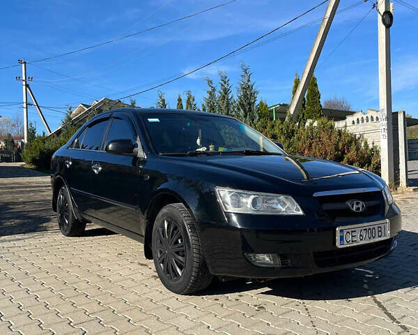Черный Хендай Соната, объемом двигателя 2.36 л и пробегом 272 тыс. км за 5300 $, фото 3 на Automoto.ua