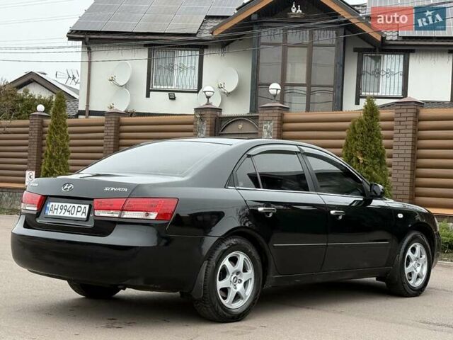 Черный Хендай Соната, объемом двигателя 2 л и пробегом 217 тыс. км за 6200 $, фото 32 на Automoto.ua