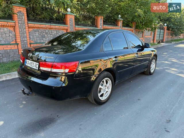 Черный Хендай Соната, объемом двигателя 2 л и пробегом 259 тыс. км за 5199 $, фото 3 на Automoto.ua