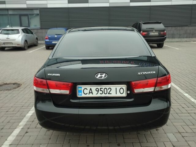Черный Хендай Соната, объемом двигателя 2 л и пробегом 244 тыс. км за 6000 $, фото 4 на Automoto.ua