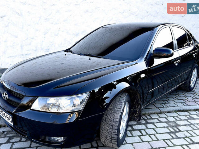Черный Хендай Соната, объемом двигателя 2.4 л и пробегом 188 тыс. км за 6300 $, фото 1 на Automoto.ua