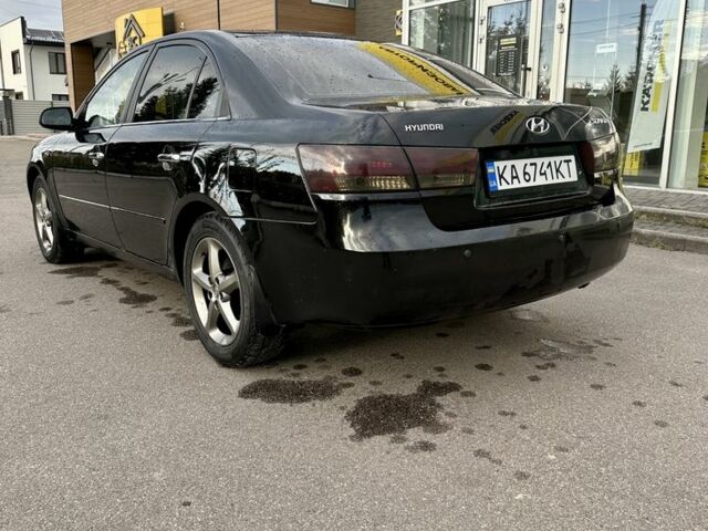 Чорний Хендай Соната, об'ємом двигуна 2.4 л та пробігом 270 тис. км за 4900 $, фото 8 на Automoto.ua