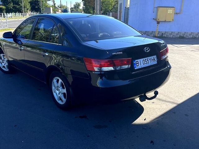 Черный Хендай Соната, объемом двигателя 2 л и пробегом 265 тыс. км за 5700 $, фото 1 на Automoto.ua
