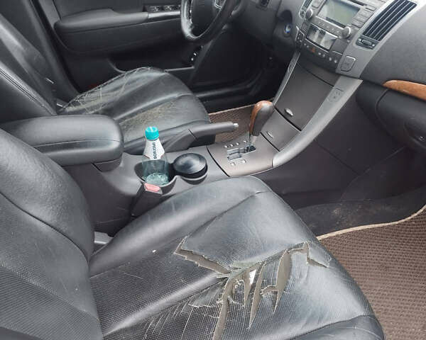 Черный Хендай Соната, объемом двигателя 2.4 л и пробегом 201 тыс. км за 5800 $, фото 13 на Automoto.ua