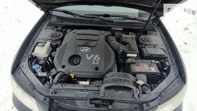 Черный Хендай Соната, объемом двигателя 3.34 л и пробегом 158 тыс. км за 7500 $, фото 24 на Automoto.ua