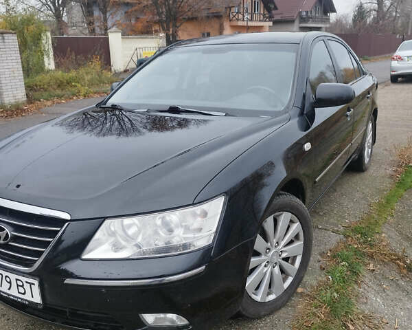 Черный Хендай Соната, объемом двигателя 2.4 л и пробегом 201 тыс. км за 5800 $, фото 1 на Automoto.ua