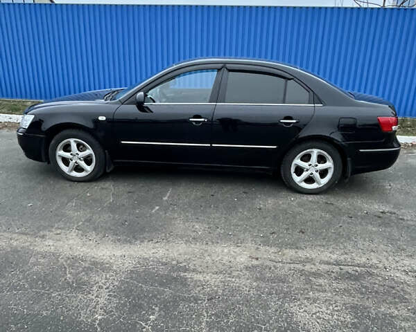 Чорний Хендай Соната, об'ємом двигуна 2.36 л та пробігом 220 тис. км за 2400 $, фото 1 на Automoto.ua