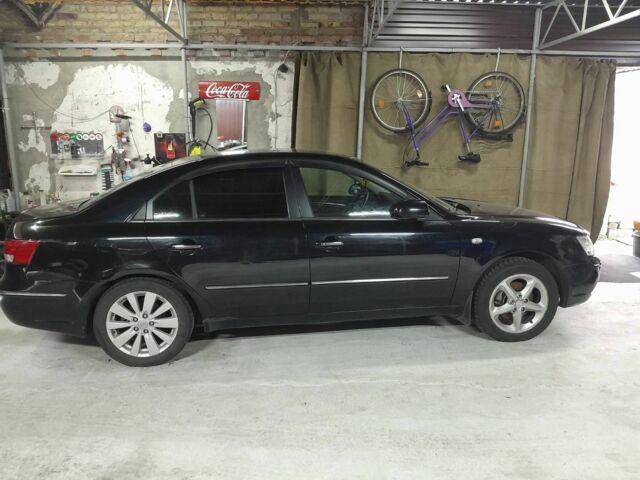 Черный Хендай Соната, объемом двигателя 2.4 л и пробегом 2 тыс. км за 3500 $, фото 3 на Automoto.ua