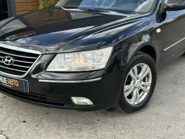 Черный Хендай Соната, объемом двигателя 2 л и пробегом 270 тыс. км за 5450 $, фото 1 на Automoto.ua
