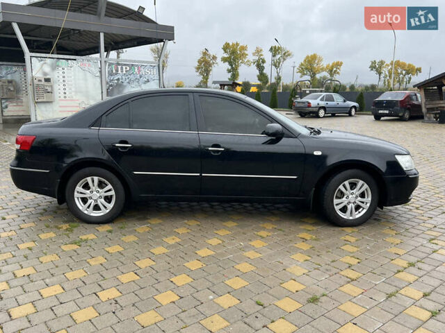 Чорний Хендай Соната, об'ємом двигуна 2 л та пробігом 281 тис. км за 5700 $, фото 3 на Automoto.ua