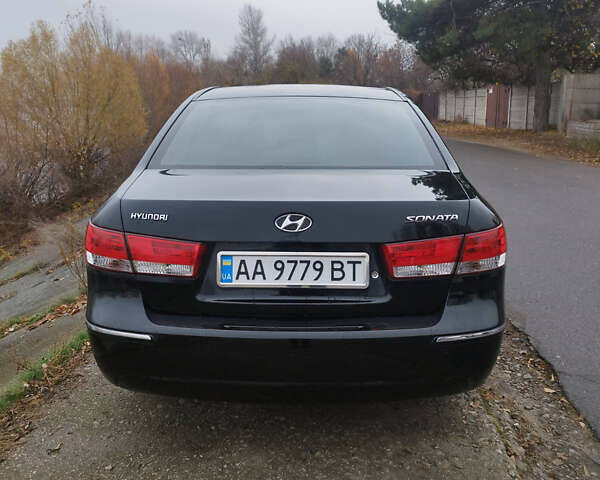 Черный Хендай Соната, объемом двигателя 2.4 л и пробегом 201 тыс. км за 5800 $, фото 5 на Automoto.ua