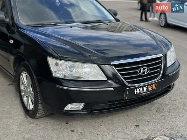 Черный Хендай Соната, объемом двигателя 2 л и пробегом 270 тыс. км за 5400 $, фото 7 на Automoto.ua