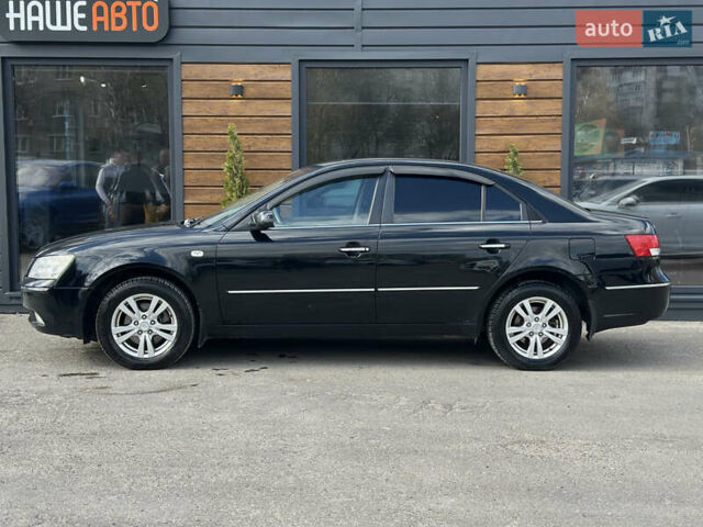 Черный Хендай Соната, объемом двигателя 2 л и пробегом 270 тыс. км за 5400 $, фото 8 на Automoto.ua