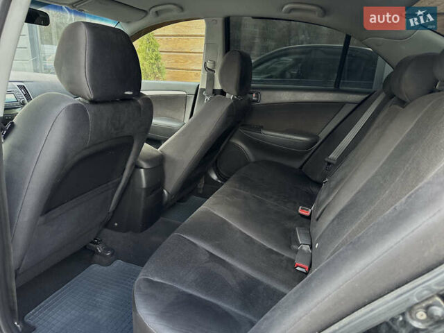 Черный Хендай Соната, объемом двигателя 2 л и пробегом 270 тыс. км за 5400 $, фото 44 на Automoto.ua