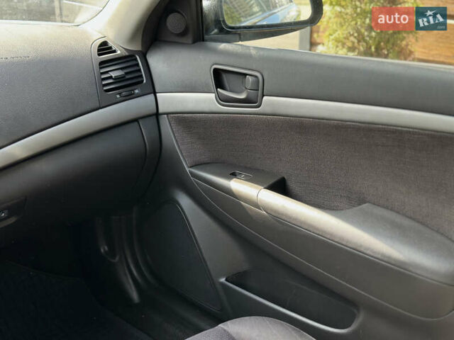 Черный Хендай Соната, объемом двигателя 2 л и пробегом 270 тыс. км за 5400 $, фото 39 на Automoto.ua