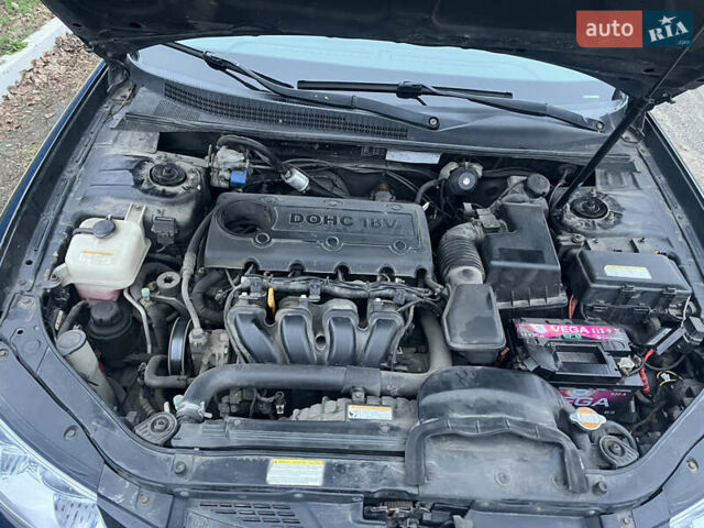 Чорний Хендай Соната, об'ємом двигуна 2.36 л та пробігом 220 тис. км за 3950 $, фото 10 на Automoto.ua