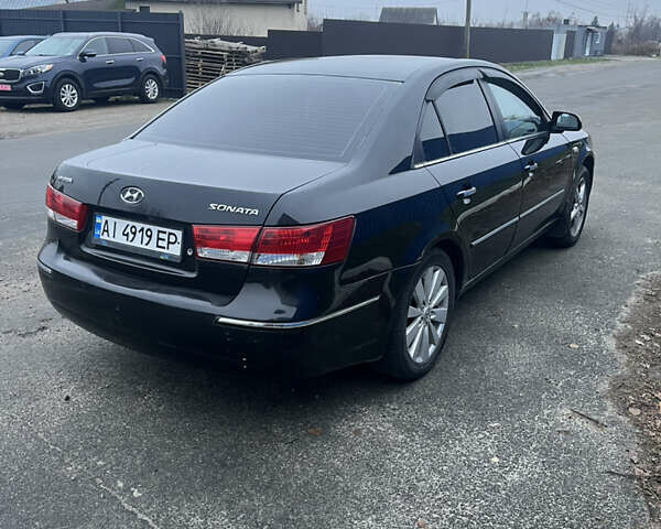 Чорний Хендай Соната, об'ємом двигуна 2.36 л та пробігом 220 тис. км за 3950 $, фото 4 на Automoto.ua