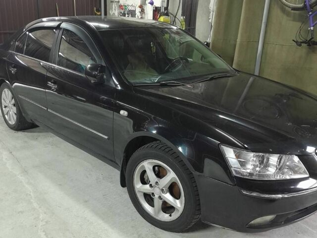 Черный Хендай Соната, объемом двигателя 2.4 л и пробегом 2 тыс. км за 3500 $, фото 4 на Automoto.ua