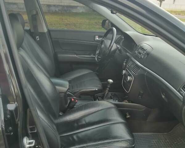 Черный Хендай Соната, объемом двигателя 2.4 л и пробегом 290 тыс. км за 5800 $, фото 6 на Automoto.ua