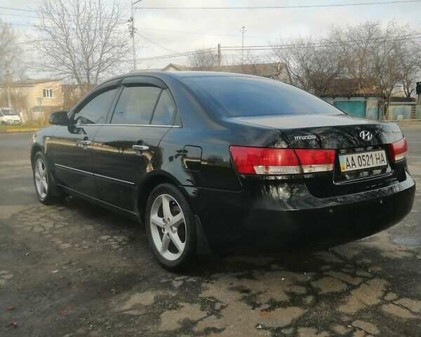 Черный Хендай Соната, объемом двигателя 2.4 л и пробегом 290 тыс. км за 5800 $, фото 2 на Automoto.ua