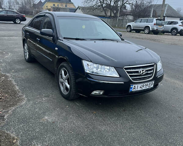 Чорний Хендай Соната, об'ємом двигуна 2.36 л та пробігом 220 тис. км за 3950 $, фото 3 на Automoto.ua