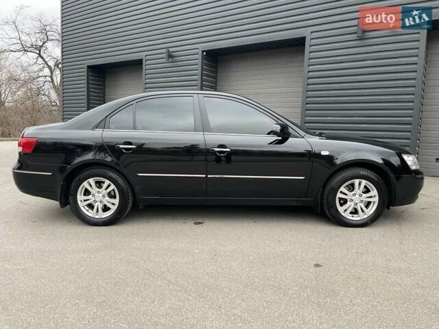 Черный Хендай Соната, объемом двигателя 2 л и пробегом 110 тыс. км за 9700 $, фото 22 на Automoto.ua