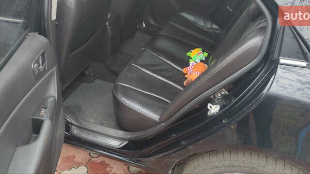 Черный Хендай Соната, объемом двигателя 2.4 л и пробегом 275 тыс. км за 6000 $, фото 16 на Automoto.ua