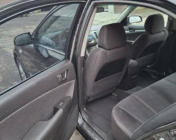 Черный Хендай Соната, объемом двигателя 2 л и пробегом 264 тыс. км за 5400 $, фото 9 на Automoto.ua