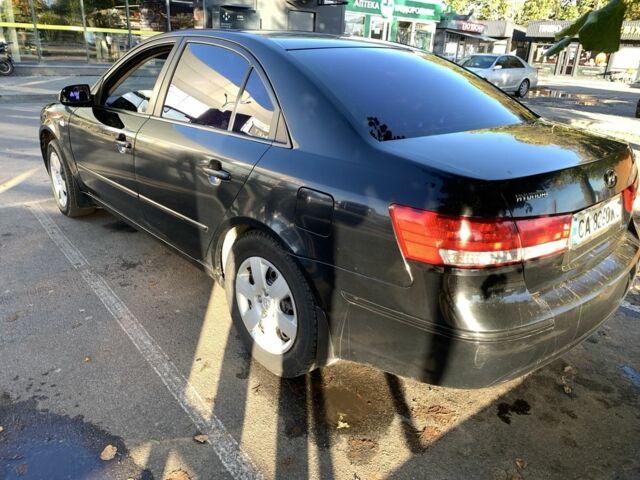 Черный Хендай Соната, объемом двигателя 2 л и пробегом 250 тыс. км за 6300 $, фото 2 на Automoto.ua