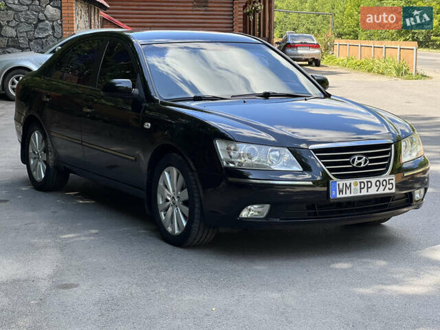 Чорний Хендай Соната, об'ємом двигуна 2.4 л та пробігом 176 тис. км за 8500 $, фото 1 на Automoto.ua