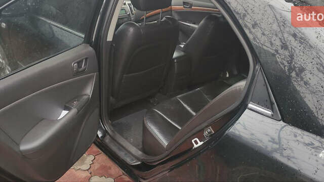 Черный Хендай Соната, объемом двигателя 2.4 л и пробегом 275 тыс. км за 6000 $, фото 18 на Automoto.ua