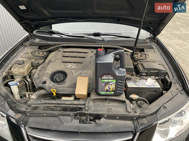 Черный Хендай Соната, объемом двигателя 3.3 л и пробегом 203 тыс. км за 8200 $, фото 3 на Automoto.ua