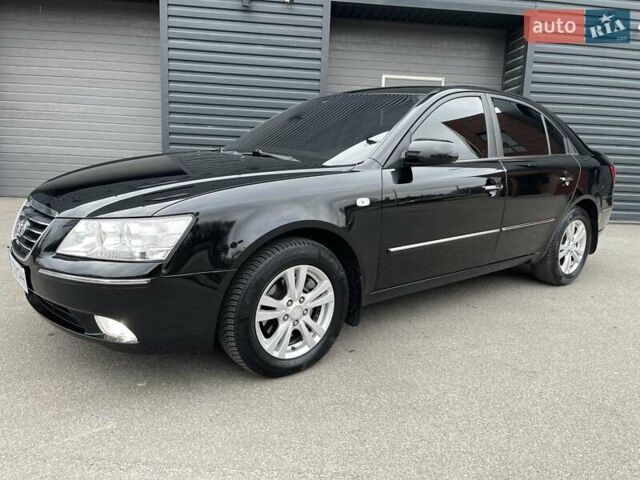 Черный Хендай Соната, объемом двигателя 2 л и пробегом 110 тыс. км за 9700 $, фото 7 на Automoto.ua