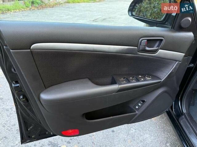 Чорний Хендай Соната, об'ємом двигуна 2 л та пробігом 109 тис. км за 6990 $, фото 9 на Automoto.ua
