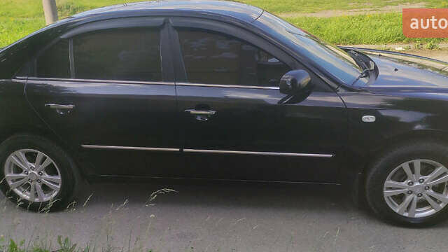 Черный Хендай Соната, объемом двигателя 2 л и пробегом 320 тыс. км за 5999 $, фото 5 на Automoto.ua