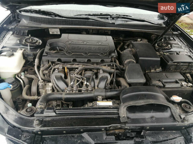 Черный Хендай Соната, объемом двигателя 2 л и пробегом 90 тыс. км за 9800 $, фото 19 на Automoto.ua