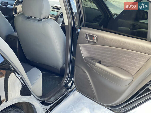 Черный Хендай Соната, объемом двигателя 2 л и пробегом 90 тыс. км за 9800 $, фото 6 на Automoto.ua