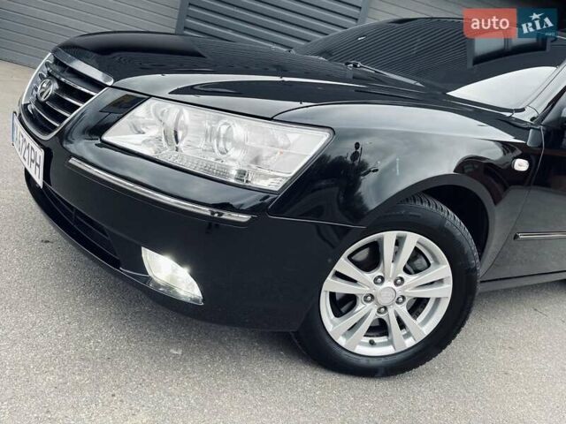 Черный Хендай Соната, объемом двигателя 2 л и пробегом 110 тыс. км за 9700 $, фото 26 на Automoto.ua