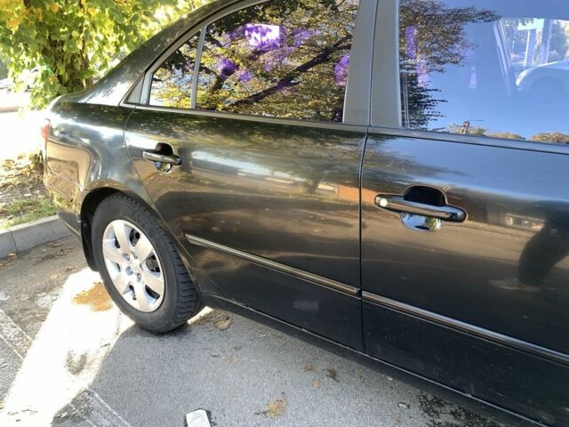 Черный Хендай Соната, объемом двигателя 2 л и пробегом 250 тыс. км за 6300 $, фото 6 на Automoto.ua