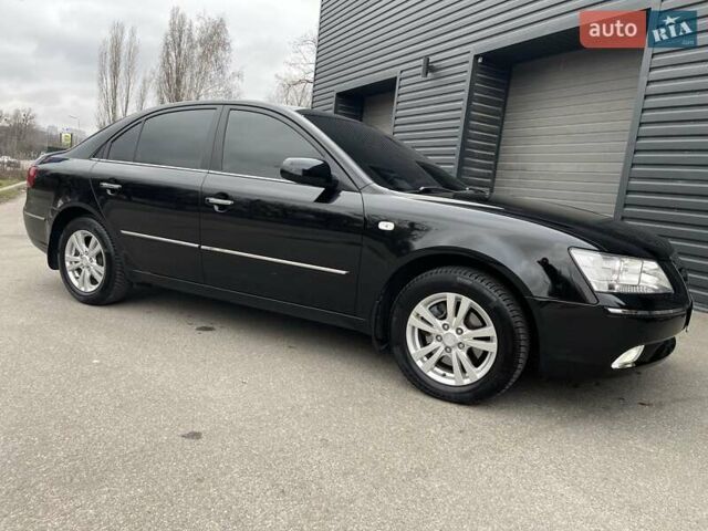 Черный Хендай Соната, объемом двигателя 2 л и пробегом 110 тыс. км за 9700 $, фото 23 на Automoto.ua