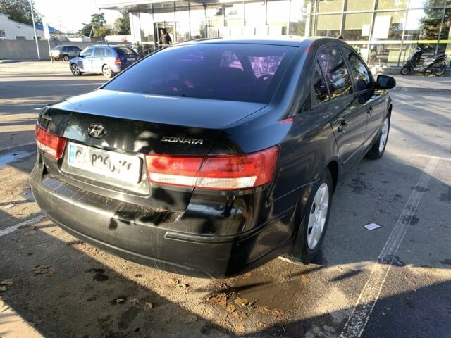 Черный Хендай Соната, объемом двигателя 2 л и пробегом 250 тыс. км за 6300 $, фото 7 на Automoto.ua
