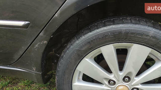 Черный Хендай Соната, объемом двигателя 2.4 л и пробегом 275 тыс. км за 6000 $, фото 1 на Automoto.ua